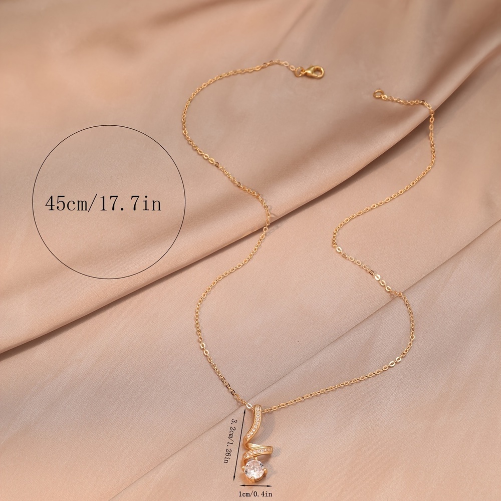 Exquisite 18K Gold-Plated Zircon Pendant: Elegant Rotating Design - Picture 4 of 6
